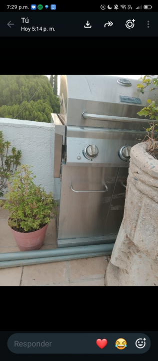 Mesa de exterior rattan y asador 