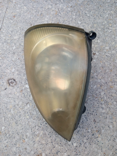 Faro izquierdo Nissan Platina