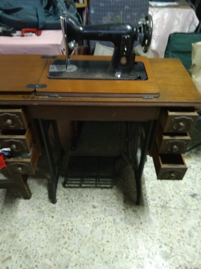 Maquina de coser Singer 