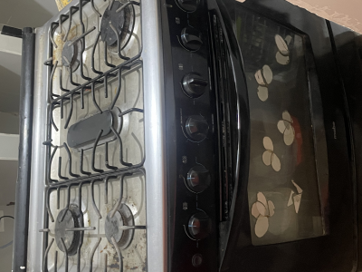 Sala, 2 gabinetes de cocina, estufa