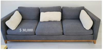Sillón gris con cojines
