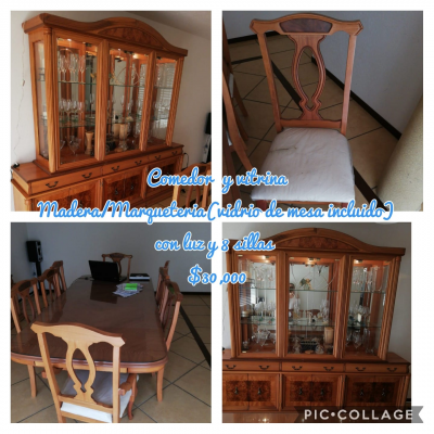 Comedor de madera con 8 sillas y vitrina