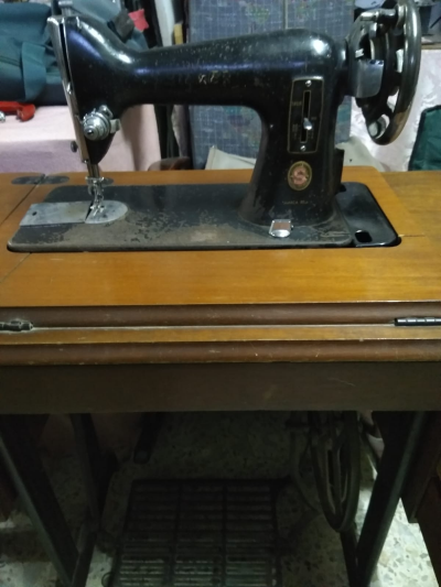 Maquina de coser Singer 